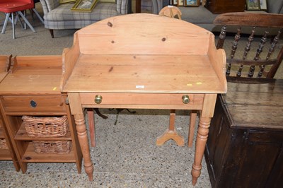 Lot 315 - A pine wash stand with galleried back