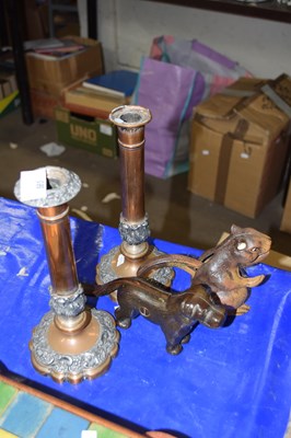 Lot 585 - Two vintage metal nut crackers, one formed as...