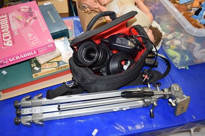 Lot 587 - A Canon EOS 1200D camera with lenses, tripod...