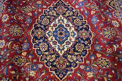 Lot 263 - Large Kashan wool floor rug decorated with a...