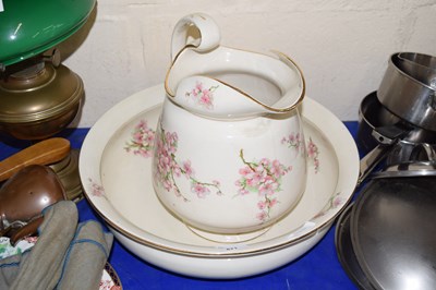 Lot 671 - A prunus pattern wash bowl and jug