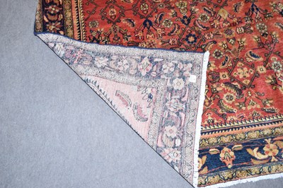 Lot 264 - Hamadan wool carpet decorated with large...