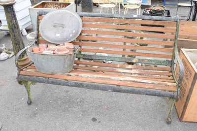 Lot 411 - A cast iron framed and wooden slatted garden...