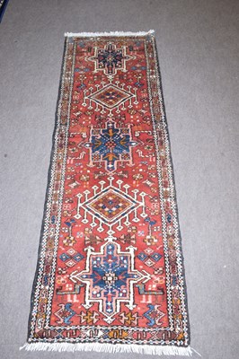 Lot 265 - Small Karajeh runner carpet decorated with...