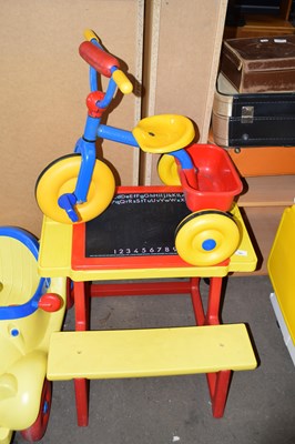 Lot 781 - Ride on trike together with child's desk