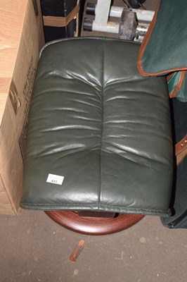 Lot 831 - A green leather footstool