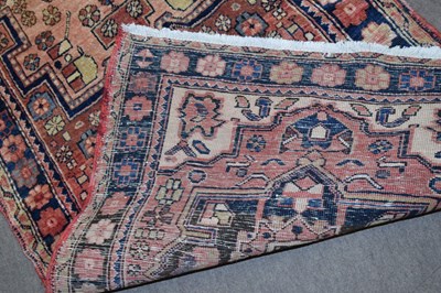 Lot 266 - Karajeh runner carpet decorated with large...