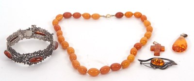 Lot 249 - A quantity of amber jewellery: to include a...