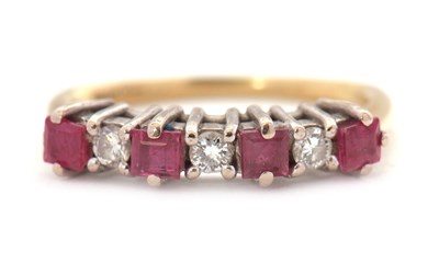 Lot 63 - A ruby and diamond ring, the alternating...