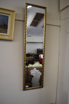 Lot 688 - MODERN NARROW RECTANGULAR WALL MIRROR IN GILT...