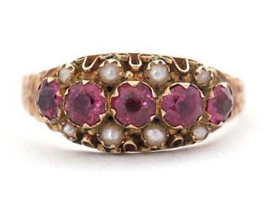Lot 26 - A late Victorain 9ct garnet and seed pearl...