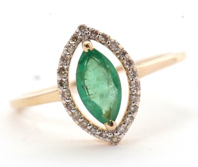 Lot 30 - An emerald and diamond ring, the marquise...