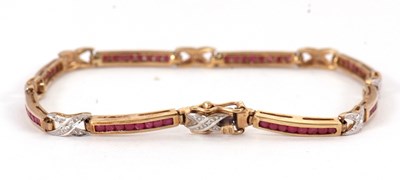 Lot 99 - A 9ct ruby and diamond bracelet, the long...