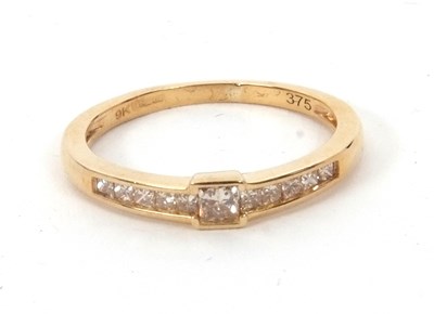 Lot 161 - A 9ct diamond ring, set with princess cut...