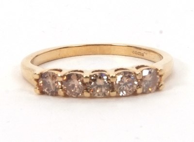 Lot 158 - A 9ct Argyle champagne diamond ring, the five...