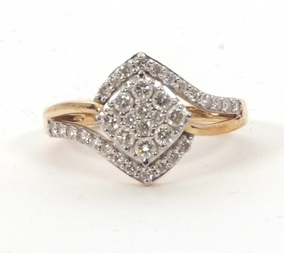 Lot 156 - A 9ct diamond ring, the central diagonal panel...