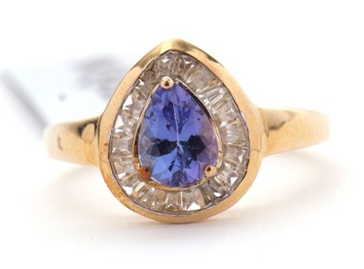 Lot 33 - A 9ct tanzanite and white zircon ring, the...