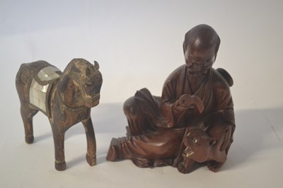 Lot 312 - A carved wooden model of a Chinese scholar...