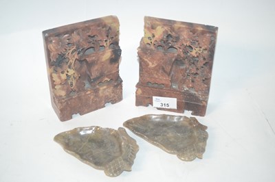 Lot 208 - A pair of rectangular soap stone carvings with...