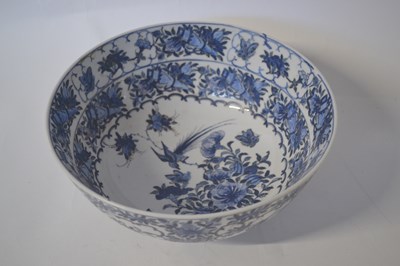Lot 317 - A Chinese punch bowl with blue and white...