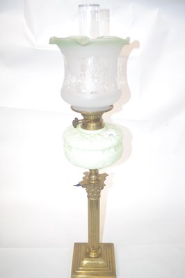 Lot 275 - A Victorian oil lamp with glass reservoir and...