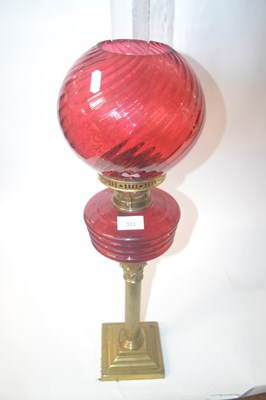 Lot 333 - Victorian oil lamp with cranberry glass shade...