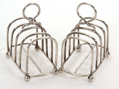 Lot 127 - A pair of early 20th Century silver toast...