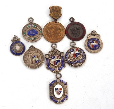 Lot 143 - Football Interest - A group of six silver and...