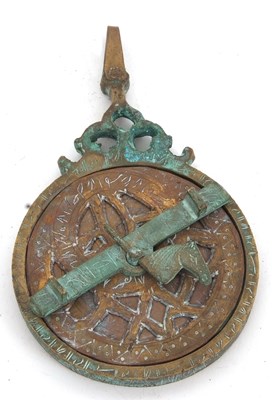 Lot 155 - An antique Indo Persian bronze Quibla...