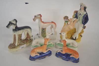 Lot 354 - Group of Staffordshire pen holders modelled as...