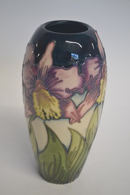 Lot 366 - A boxed Moorcroft vase with a floral design by...