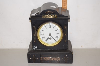 Lot 58 - A black slate cased mantel clock