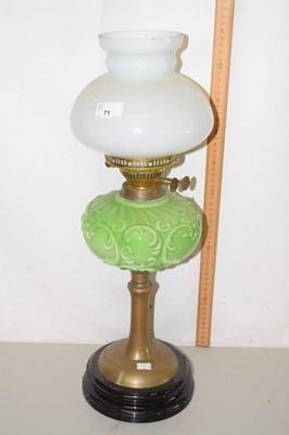 Lot 71 - Oil lamp with moulded green glass font and...