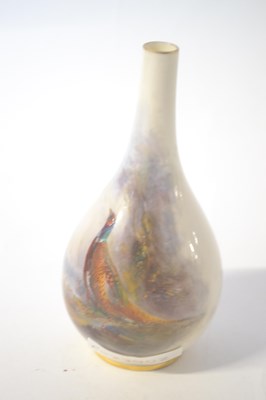 Lot 390 - A small Royal Worcester bottle vase painted...