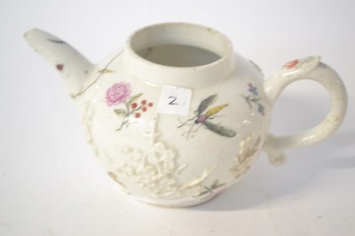 Lot 409 - An early Bow porcelain teapot with moulded...
