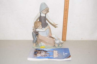 Lot 90A - A Lladro model of children with a goose