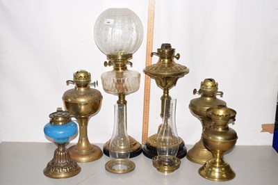 Lot 149 - A group of six various oil lamps mainly brass