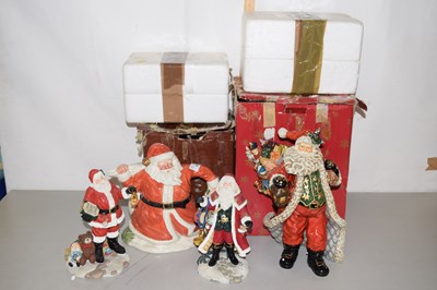 Lot 179 - A collection of Santa Claus ornaments and...
