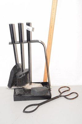 Lot 204 - A fire companion set