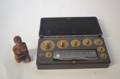 Lot 319 - A bakelite boxed set of postal weights...