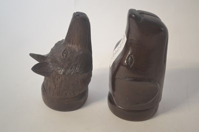 Lot 478 - Two carved wooden stirrup cups
