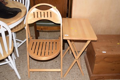 Lot 258 - Modern light wood folding table and chairs