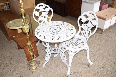 Lot 263 - Cast iron garden table and two chairs with...