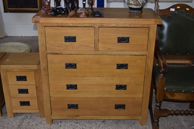 Lot 265 - A modern oak five drawer bedroom chest