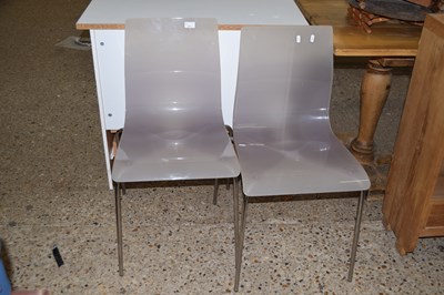 Lot 273 - A pair of perspex ghost type chairs
