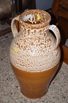 Lot 300 - A large mid Century double handled vase with...