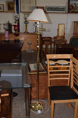 Lot 303 - An adjustable standard lamp