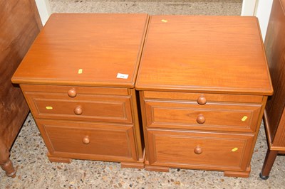 Lot 314 - Pair of teak finish bedside cabinets
