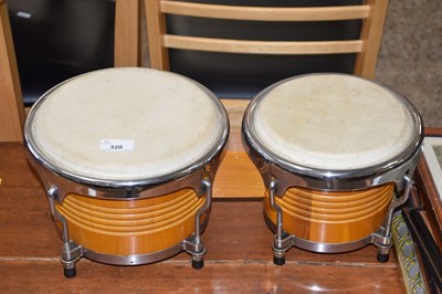 Lot 320 - Pair of bongo drums