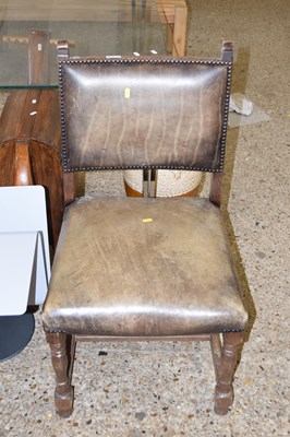 Lot 323 - A leather upholstered dining chair
